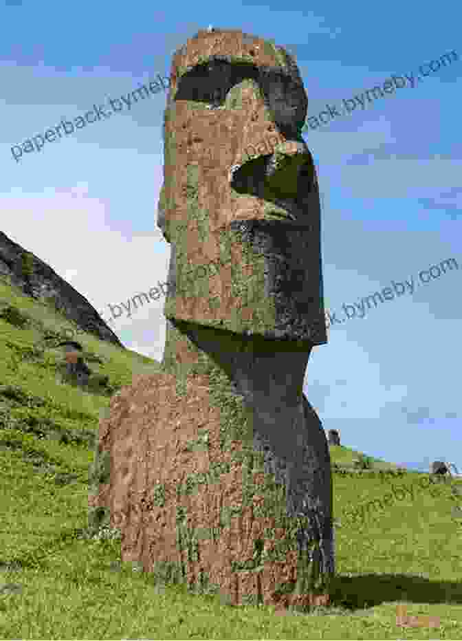 A Large Moai Statue On Easter Island, With The Vast Pacific Ocean In The Background Capturing Easter Island Robbie Freeman Shugart