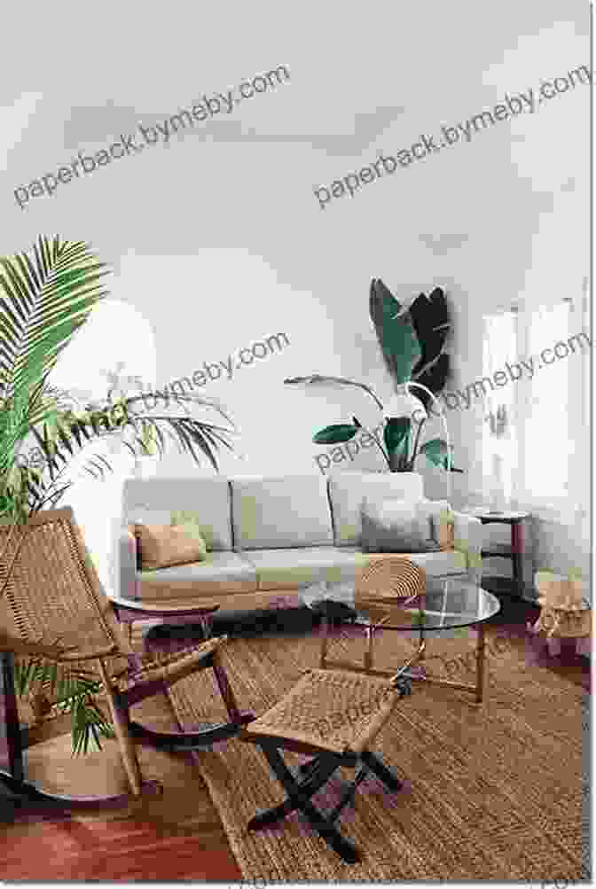 A Person Sitting In A Minimalist Living Room, Surrounded By A Few Pieces Of Furniture And Plants. How Much Stuff Is Really Enough