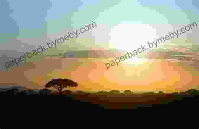 A Silhouette Of An African Village Against A Vibrant Sunset Sky Shadows In An African Twilight: Game Ranger Soldier Hunter