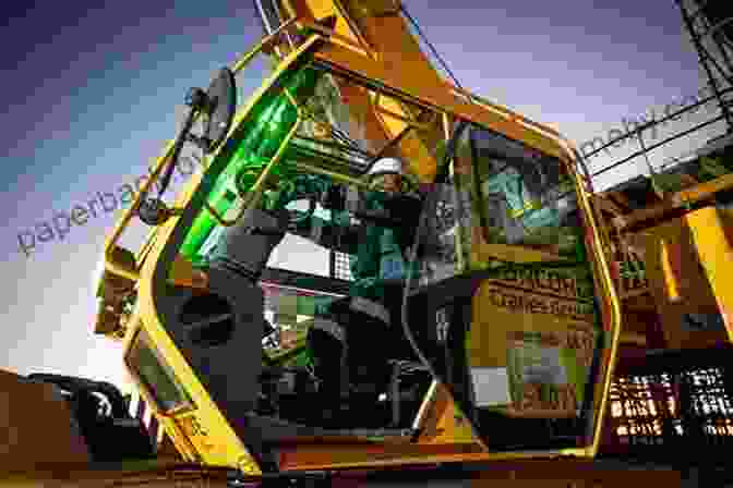 A Skilled Crane Operator Meticulously Controlling The Crane's Movements From An Elevated Cab. Amazing Machines: Colossal Cranes