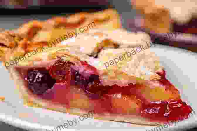 A Slice Of Pie With A Flaky Crust And A Juicy Fruit Filling KERRY ANDY COMPLETE ON PIE: Everything You Need To Know To Bake Perfect Pies Getting Started With Numerous Recipes Materials Needed As First Time Baker Ingredients Step By Step Instructions