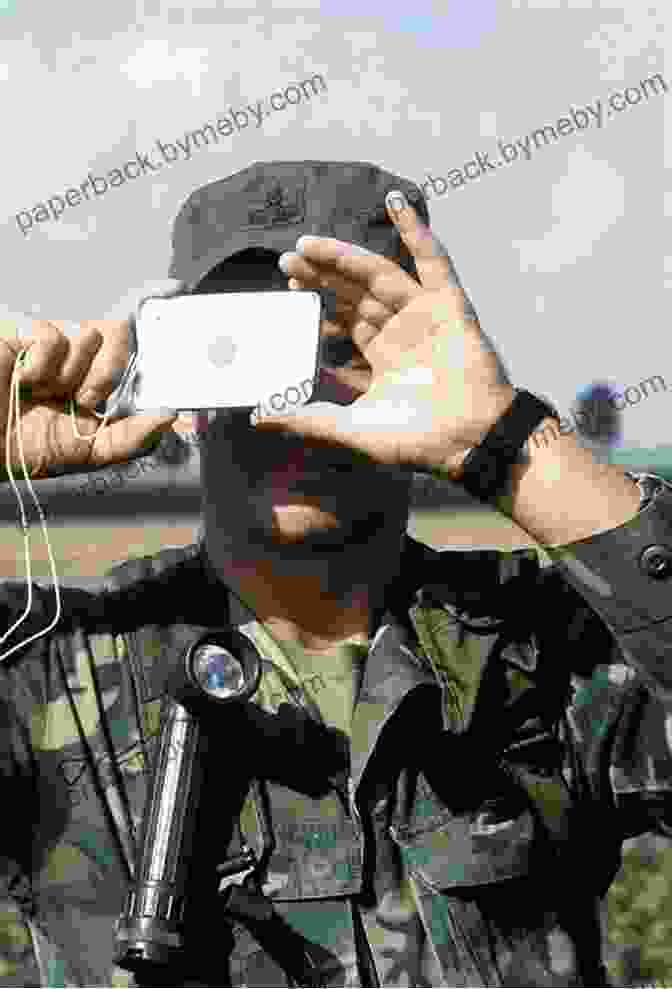 A Soldier Using A Signal Mirror To Signal For Help. Surviving With Navigation Signaling (Extreme Survival In The Military)