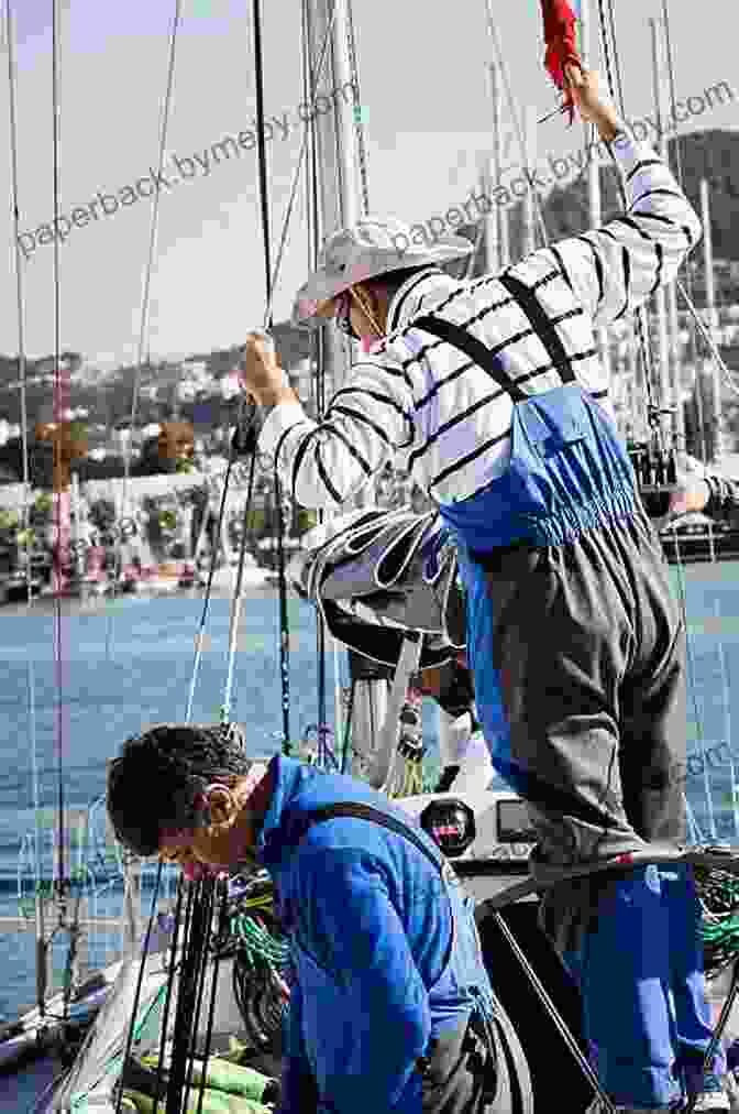 Crew Members Inspecting A Sailboat's Rigging OCEAN NOMAD: The Complete Atlantic Sailing Crew Guide How To Catch A Sailboat Ride Contribute To A Healthier Ocean