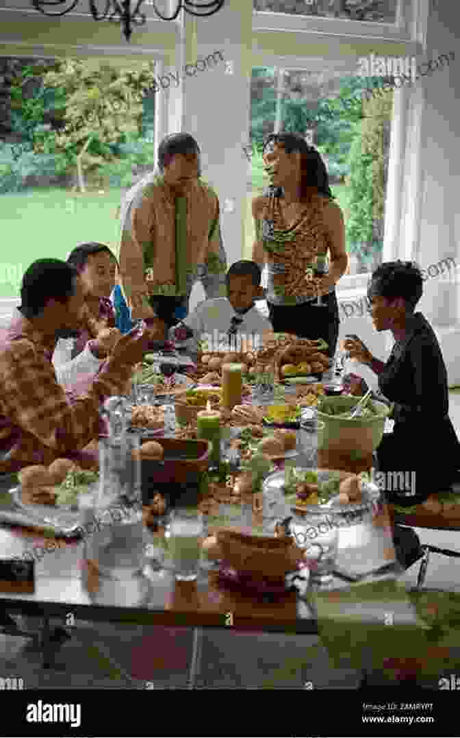 The Spencer Family Gathered Around A Dinner Table, Their Expressions A Mix Of Love And Tension Bludso S BBQ Cookbook: A Family Affair In Smoke And Soul