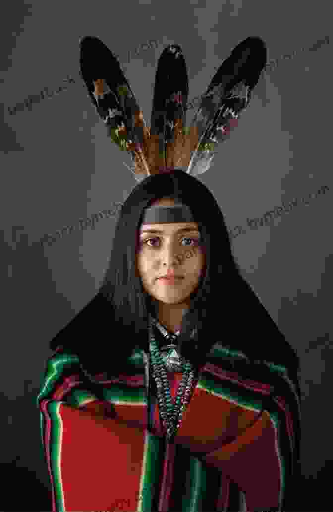 Tiana Bighorse, A Native American Woman Wearing Traditional Regalia, Standing In Front Of A Tipi Bighorse The Warrior Tiana Bighorse